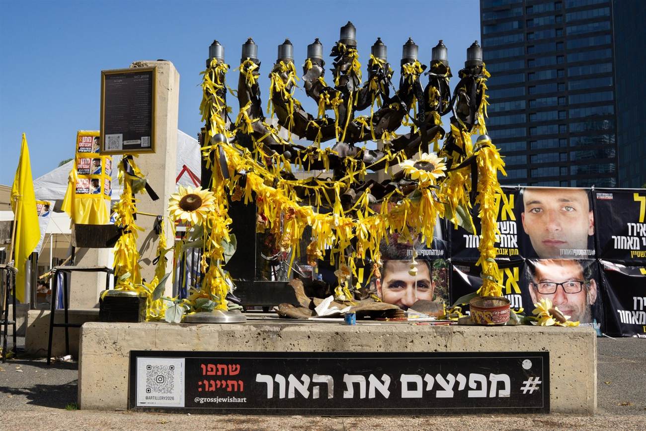 The Menorah of Hope covered in yellow ribbons and sunflowers at Hostages Square, Tel Aviv