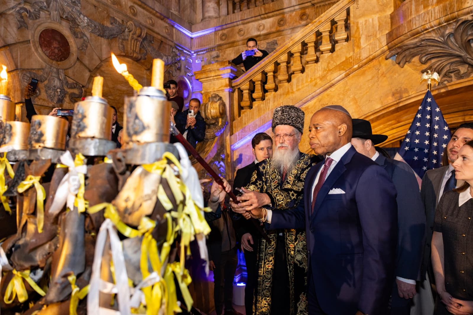 Mayor Eric Adams lighting the Menorah of Hope at New York City Hall
