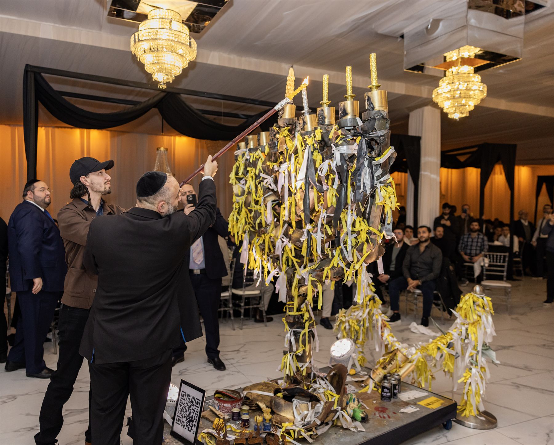 The Menorah of Hope being lit with the Syrian Jewish community of New York
